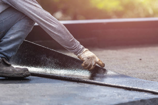 Professional Emergency Waterproofing technician working in Freeland, MI